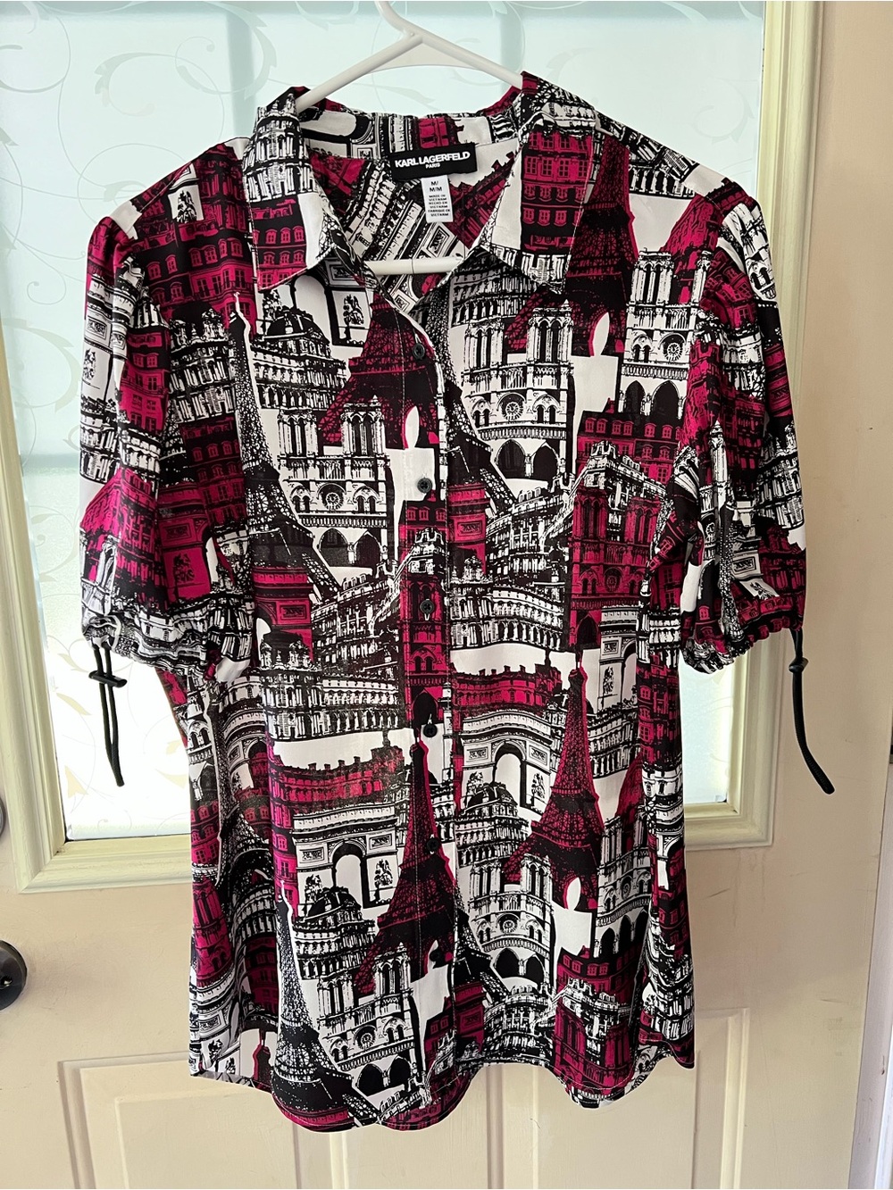Karl Lagerfeld Paris short sleeve button down blouse whimsical Parisian print.